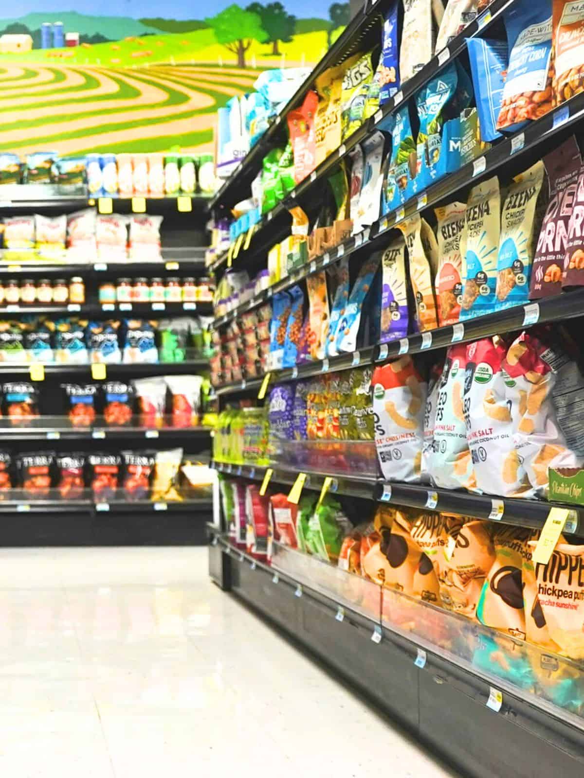 A store aisle with snack foods.