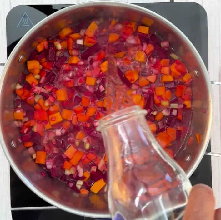 Boiling of cooked down Nomato Sauce vegetables